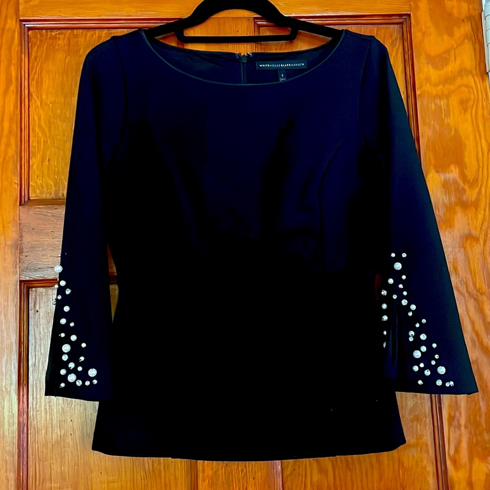 White House Black Market top with pearls and beads on the sleeves.